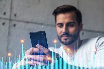 A man using smart phone. Double exposure. Math chart hologram. Financial trading on-line brokerage concept.
