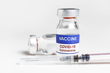 Macro shot of antiviral vaccine vial for immunization against covid-19 virus. Isolated on white...