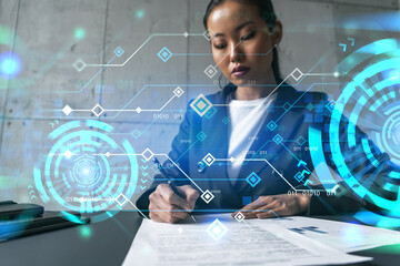 A woman signs contract and technology theme hologram. Multiexposure. International business.