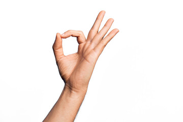Hand of caucasian young man showing fingers over isolated white background gesturing approval...