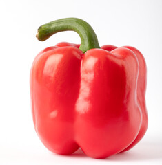 Red bell pepper with a green tail on a white background for use on labels.