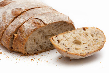 sliced rye bread on a white background