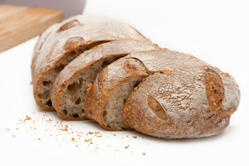 sliced rye bread on a white background