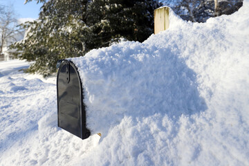 Mailbox covered in snow after a blizzard