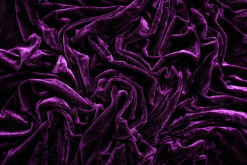 Folds of deep purple velvet material, background - obrazy, fototapety, plakaty