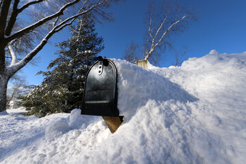 Mailbox covered in snow after a blizzard