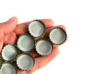 metal soda bottle caps, soda caps, close-up on white background,