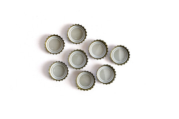 metal soda bottle caps, soda caps, close-up on white background,