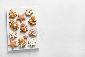 Christmas homemade glazed cookies on white background. View from above. Flat lay. Space for text.