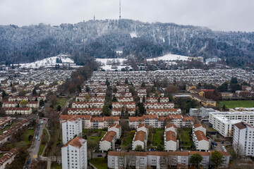 view of zürich and the uetli mountain with snow 