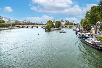 The River Seine with boats in the fork in the Ile de la Cité