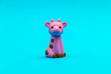 rubber toy isolated on a blue background