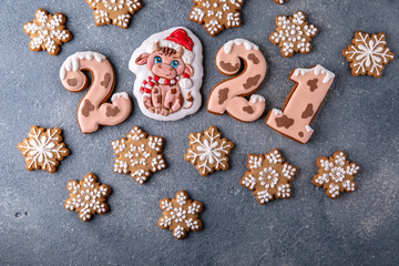 Happy New Year's set of numbers 2021. Ox-shaped cookies, symbol of the Chinese horoscope. Christmas homemade gingerbread cookies.