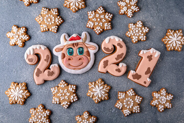 Happy New Year's set of numbers 2021. Ox-shaped cookies, symbol of the Chinese horoscope. Christmas homemade gingerbread cookies.
