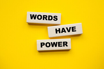 WORDS HAVE POWER inscription on CUBES , yellow pen on a yellow background. a bright solution for business, financial, marketing concept