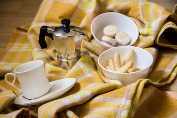 Espresso and cookie time on the yellow rug