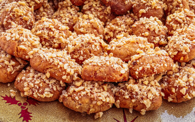 home made "melomacarona" Greek cookies with nuts and honey syrup, sweet background