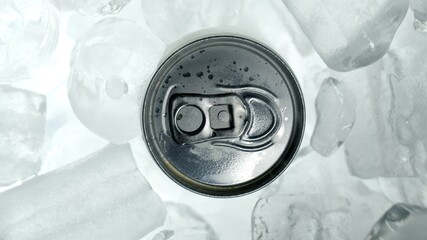 Aluminium steel beverage can in ice