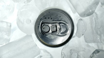 Aluminium steel beverage can in ice