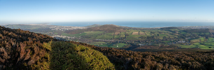 Panoramic view from the top of Great Sugar Loaf in Ireland, Wicklow near Dublin. Amazing weather