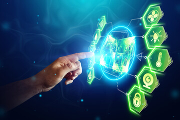 Male hand and smart home interface on a blue background. Automation concept, modern house, new technologies.