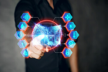 Male hand and smart home interface on a blue background. Automation concept, modern house, new technologies.