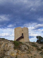 Fototapeta na wymiar Paisaje de la torre de Cala Montgó, en l'Estartit, Costa Brava, Girona, Febrero de 2018