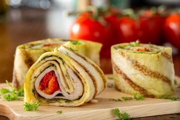 Tapas wrap with chicken, pesto and paprika