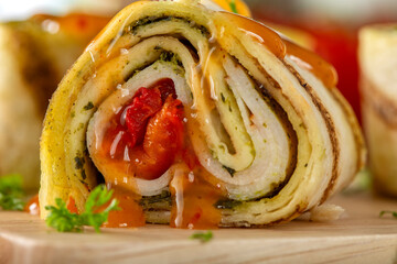 Tapas wrap with chicken, pesto and paprika