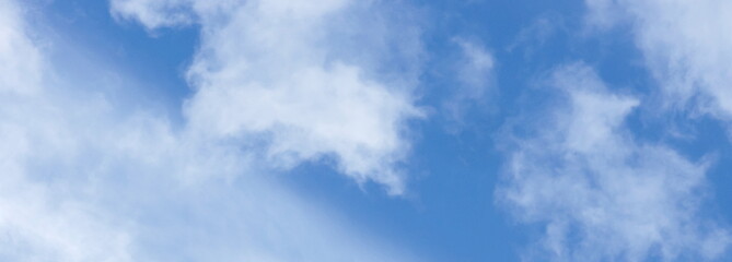 Fototapeta premium blue sky background banner with fluffy white clouds. Beautiful landscape. Poster