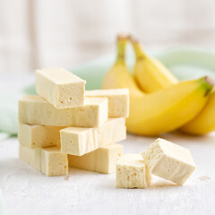 sweet confectionery Pastila with Banana puree a on bright table.