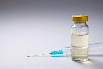 Closeup of glass bottle with coronavirus medication