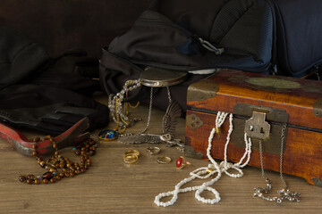Tools and the loot stolen by a thief during a burglary