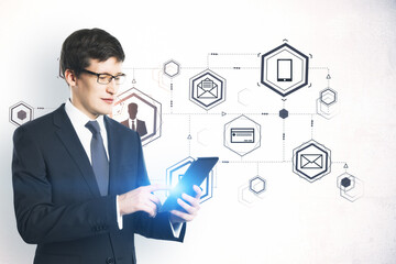 Businessman using digital tablet and drawing computer cloud diagram.