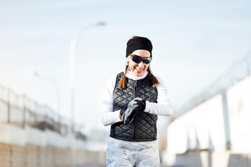 Fototapeta na wymiar Female Runner With Smartband Watch.