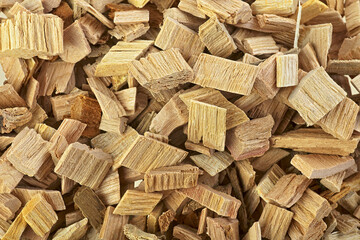 Wood chips for smoking. Wood texture. Wooden chips background. Wooden pieces of apple tree.