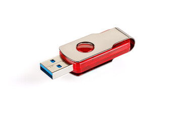 Red and silver USB 3.0 flash drive isolated on white background . USB Pen Drive or flash drive on white background. Close-up. Full depth of field.