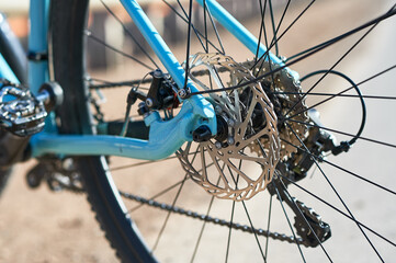 Disc brakes of a racing bike close-up. Bike stop.