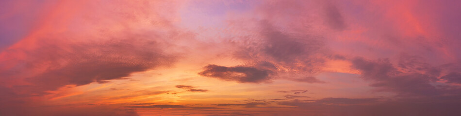 Romantic sky with clouds at sunset.