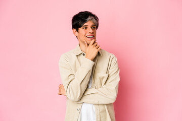 Fototapeta premium Young skinny hispanic man relaxed thinking about something looking at a copy space.