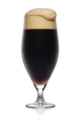 Misted glass of black stout dark beer isolated on a white.