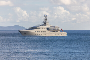 Fototapeta na wymiar Mega Yachts anchored in Indian Bay, Saint Vincent and the Grenadines
