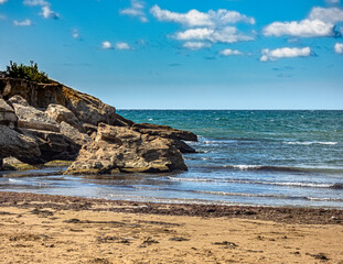 Seascape rock, beach and sea. Travel and Leisure.