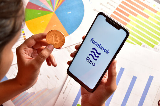 facebook cryptocurrency libra in hand, 