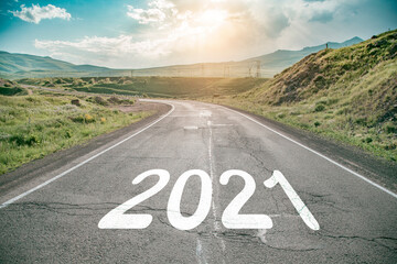 asphalt road with 2021 with blue abstract sky