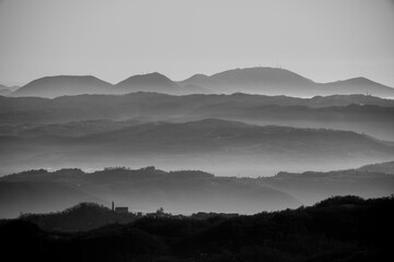 stratified fog between the hills four - 399126724
