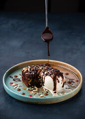 Chocolate brownie with vanilla ice-cream and chocolate sauce, chocolate brownie and ice cream