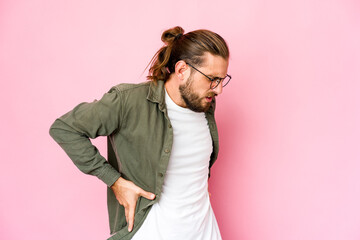 Young man with long hair look suffering a back pain.