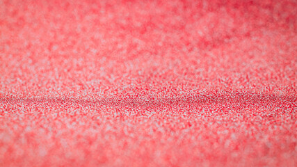 Abstract gold background. Christmas glitter red pattern with bright sparkle bokeh texture for xmas shine silver design. Celebratory, luxury party concept.