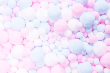 White, pink and blue soft pompons.